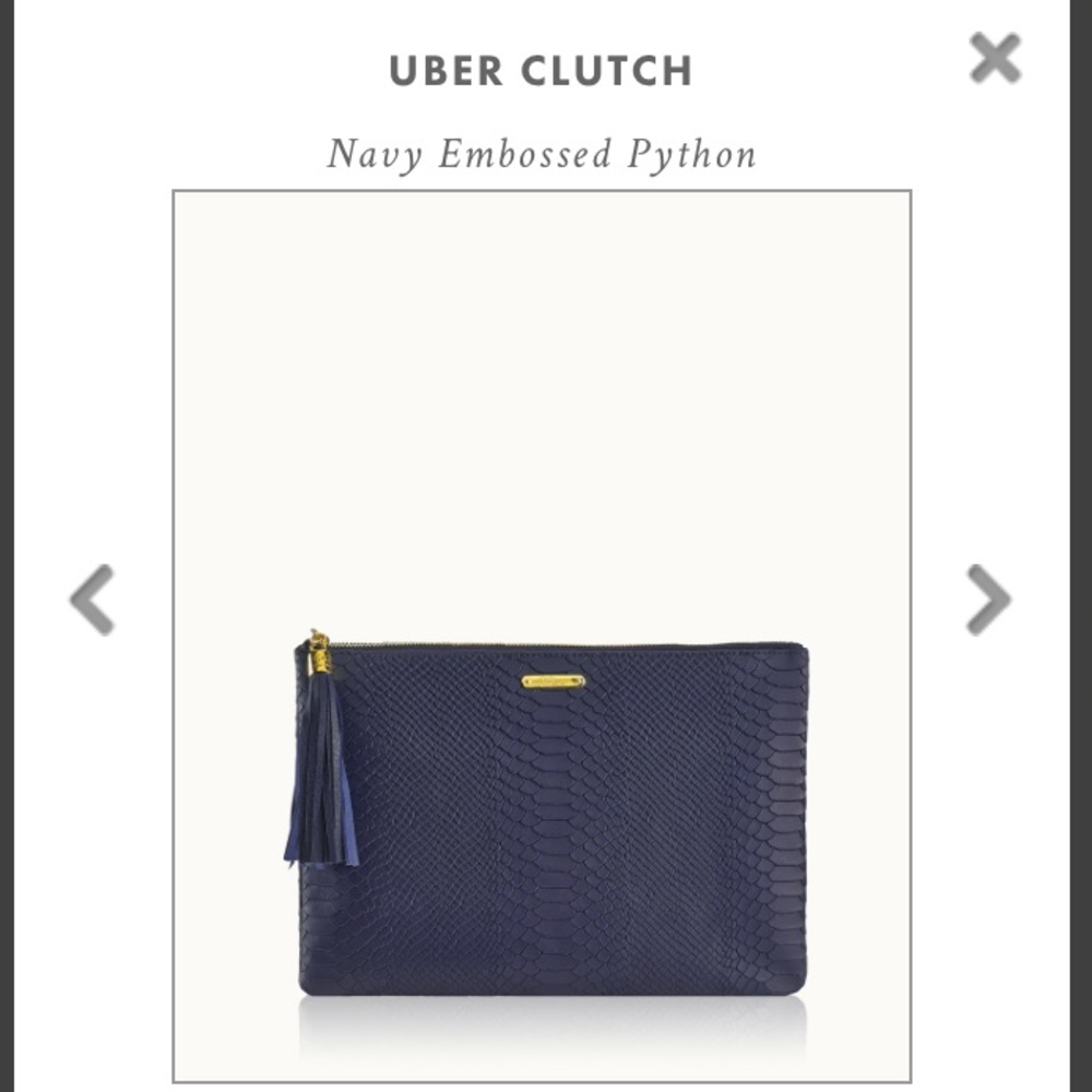 Gigi uber clutch in navy embossed python